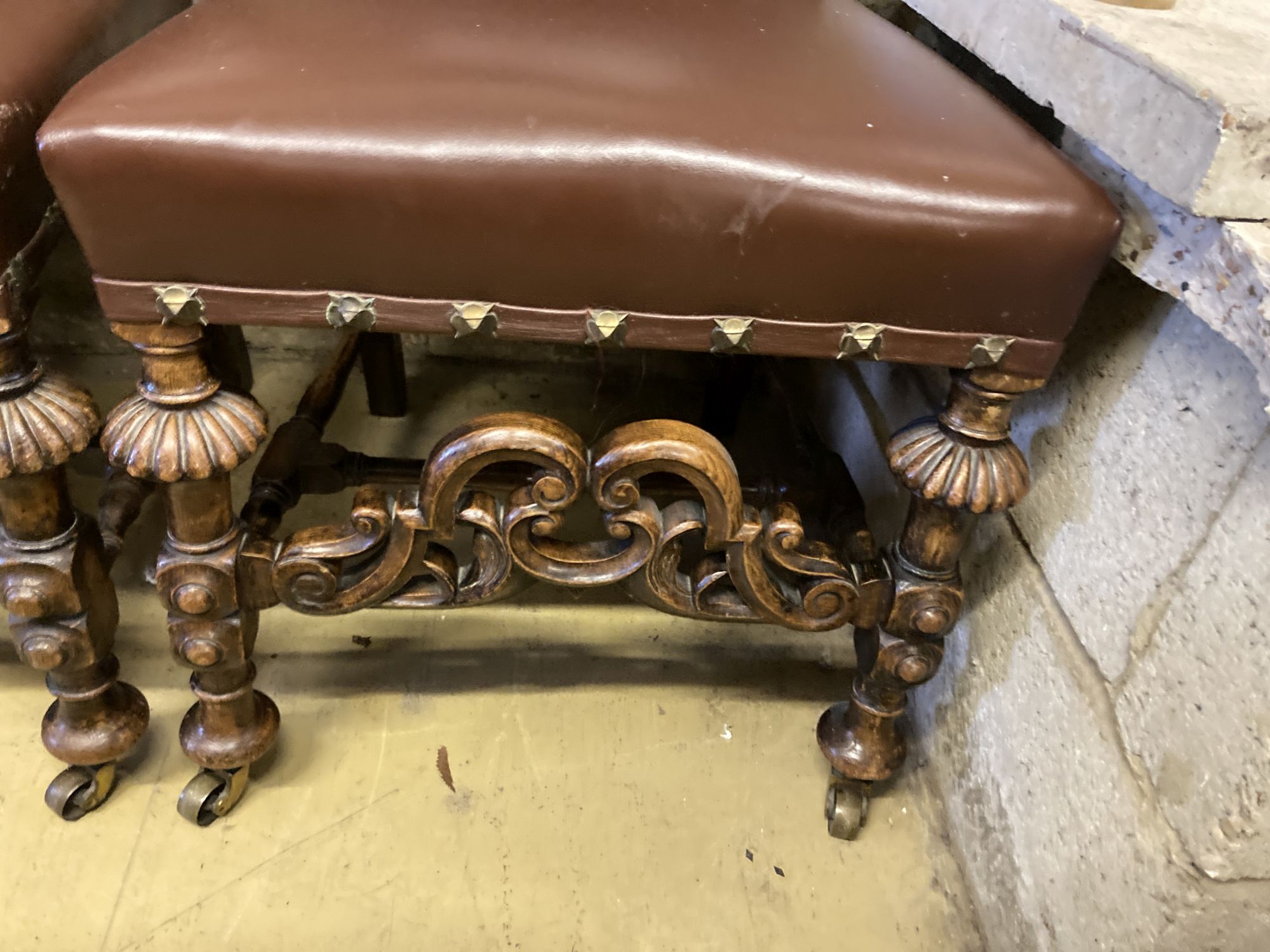 Two early 20th century oak Carolean design dining chairs by Waring & Son